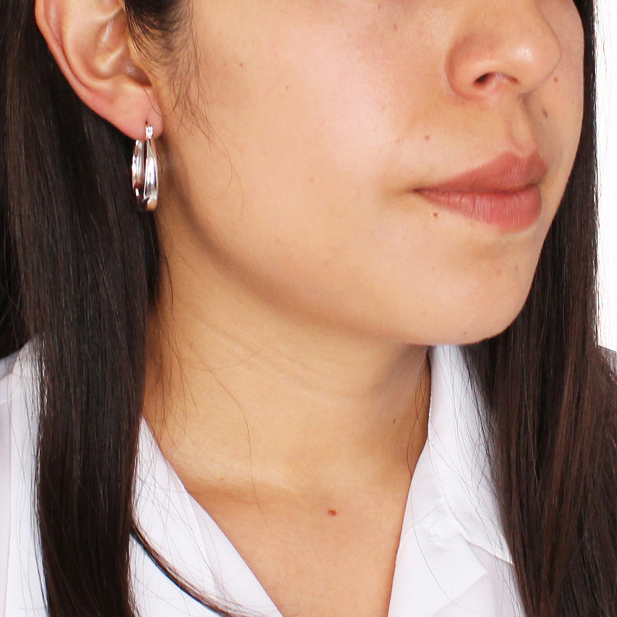 Aretes Nine West color plateado 79943604-G03
